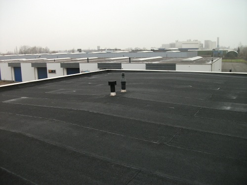 Archieffoto's zakelijk bitumen dak Killaars Steeghs Groep Reuver, pand Dr. Nolenslaan Sittard