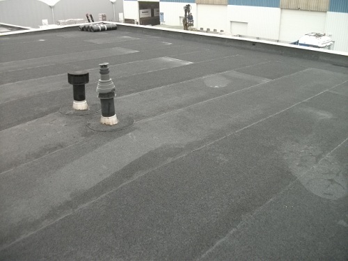 Archieffoto's zakelijk bitumen dak Killaars Steeghs Groep Reuver, pand Dr. Nolenslaan Sittard